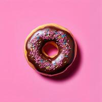 Chocolate donut on a pink background close-up photo