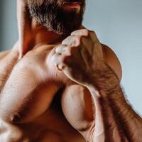 Close up of man's arm showing biceps photo