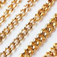 Several golden chains isolated on a white background, photo