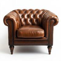 Elegant brown tufted leather armchair isolated on a clean white background photo