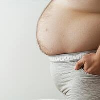 a man with a big belly. The problem of being overweight photo