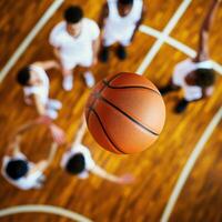 Basketball game. The players are watching a basketball. photo