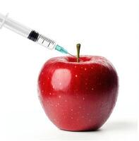 red apple with syringe photo