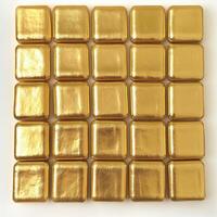 gold bars arranged neatly on a white background photo