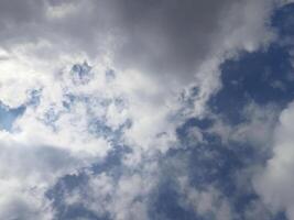 Dark blue sky with white clouds for sky background photo