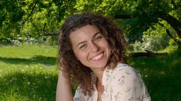 Awesome female person smiling at camera in slow motion inside. Close up of Womans Face with Great Positive Emotions, Laughing, Smiling Charmingly. video