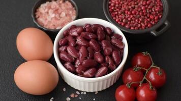 Delicious nutritious canned red beans, with salt and spices as a high-calorie breakfast addition video