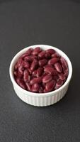 Delicious nutritious canned red beans, with salt and spices as a high-calorie breakfast addition video