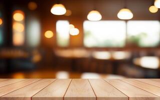 Empty wooden table top with lights bokeh on blur restaurant background. photo