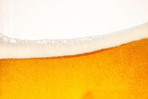 Close up bright orange Oil or beer splash texture and nature waves, Beautiful waves curve and little bubbles smooth for graphic design and background, Oil Bubbles, Soft beer bubbles, Selective focus photo