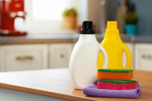 Cleaning detergents and tools on a kitchen counter photo