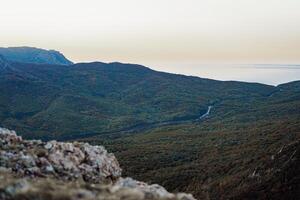 Landscape of Crimean mountains on dusk in autumn photo