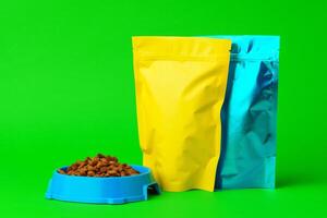 Cat food on green background in studio photo