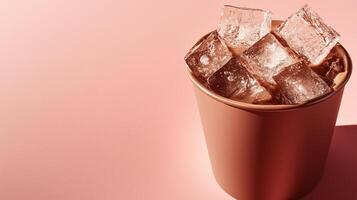 Refreshing drink served in a simple brown cup with ice cubes on a pastel background photo