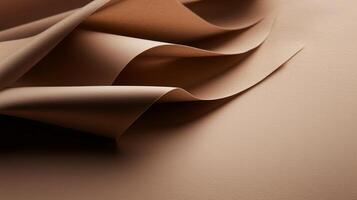 Soft brown paper folds create an elegant abstract texture on a smooth surface photo