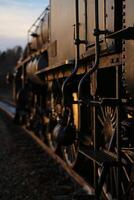 Looking forwards from the side of a historic locomotive in Kusfors in Sweden photo