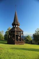 Wooden bell cage, built in 1752, of Hackas church in Sweden photo