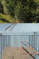 A frightening view from a rusty roof photo