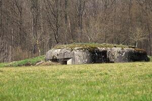 French bunker ruin near Langensoultzbach, Vosges, France. It was built before WWII as part of the Maginot Line photo