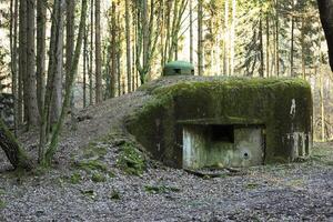 French bunker ruin near Langensoultzbach, Vosges, France. It was built before WWII as part of the Maginot Line photo