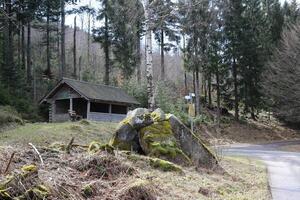 Mountain road junction with resting hut in Black Forest, Baden-Wurttemberg, Germany photo