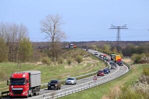 Traffic on a road with construction site in Mecklenburg-Vorpommern, Germany photo