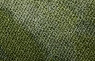 Macro shot of a green cotton textile photo