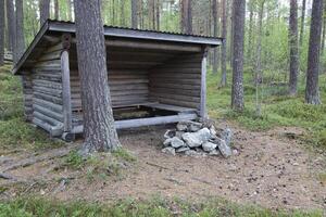Weather shelter in a forest in Jaemtland, Sweden photo