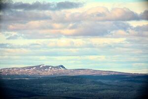 Far view on Swedish mountain in Jaemtland with slight vignetting and vintage style photo