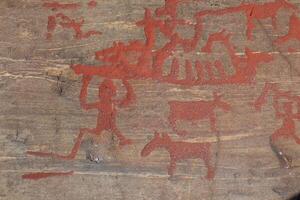 Ancient rock paintings in Naesaaker ins Sweden photo