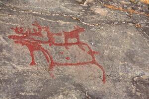 Ancient rock paintings in Naesaaker ins Sweden photo