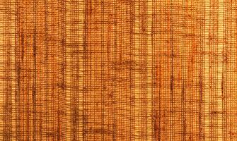 Close-up of a textile surface with orange and brown color photo