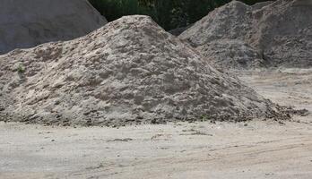 Heap of sand, an important construction material photo