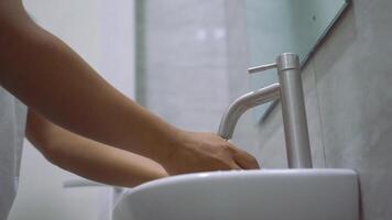 Man washing his Hands with soap in a sink to prevent virus infection and clean dirty hands. Healthcare concept. video