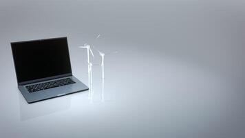 Laptop computer with wind turbine on gray background video