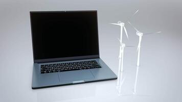 Laptop computer with wind turbines on a white background video