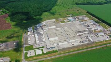 Suburban industrial zone. Aerial drone view of factory plant building video