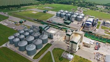 Aerial view of grain elevator. Aerial drone view of large granary in field video