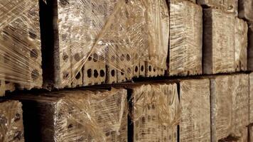 Concrete blocks at factory. Stack of precast concrete slabs in factory workshop video