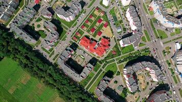 Drone view of city building block. Top down view of new modern block of flats in green area video