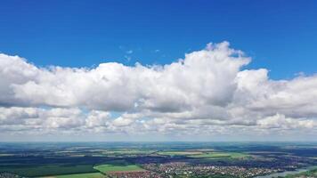 Clouds landscape over city. Part of city view above the clouds from drone video