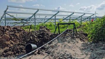 Metallic carcass of solar panels. Professional worker installing metal construction of solar panels video