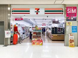 Tokyo Japan 18 Oct 2023 Unidentified shopping in seven eleven in the Narita Airport terminal 2 photo