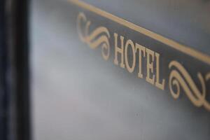 Beautiful and Elegant Hotel Signage Created in a Classic Typography Style photo