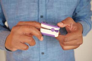 A compact device for monitoring health is conveniently held in your hands photo