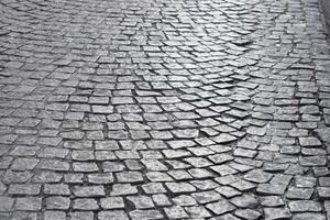 Textured Cobblestone Pavement Found in an Urban Setting and Environment photo