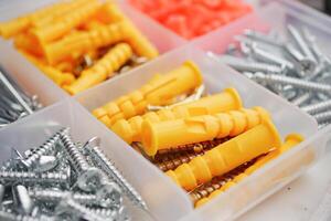 This Storage Box contains diverse screws and wall anchors for your various projects photo