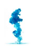Blue ink dropped in to water isolated white background. Abstract color dissolving in water photo