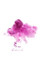 Pink ink dropped in to water isolated white background. Abstract color dissolving in water photo
