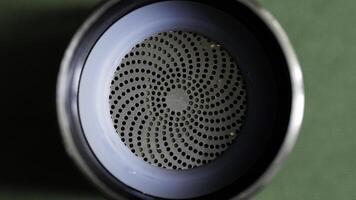 An Intricate Spiral Design that is Featured in a Modern Speakers Mesh Surface Texture photo